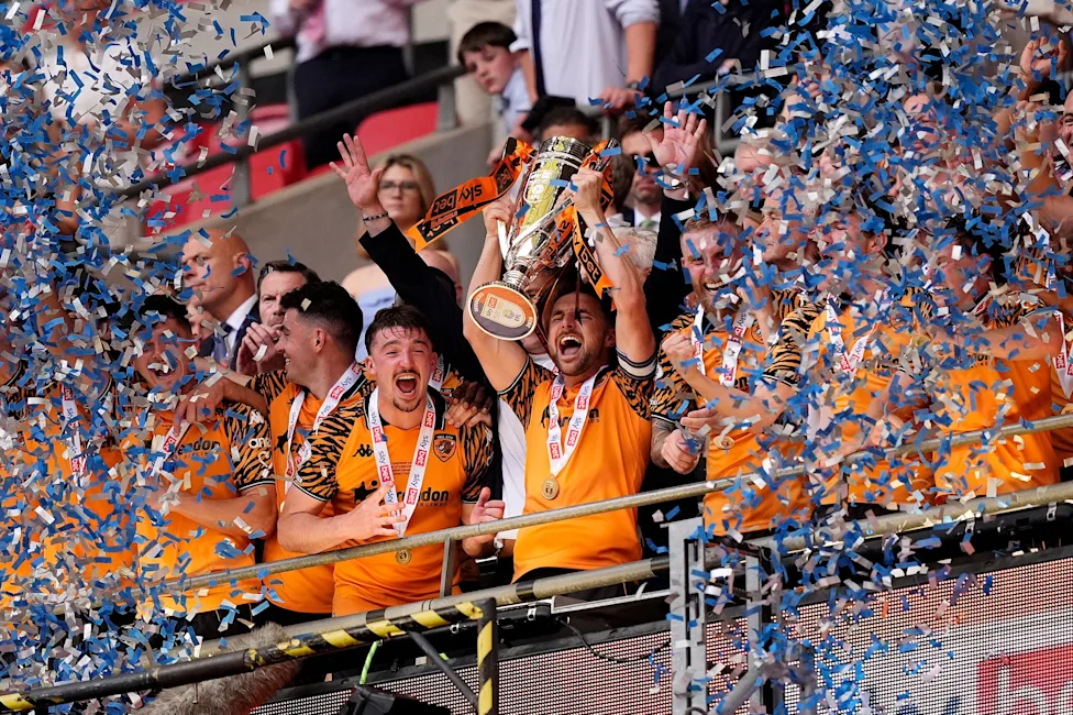 Hull lifting the 2025/26 Championship play-off final trophy